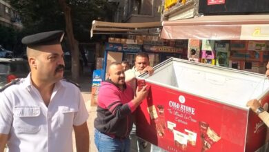صورة حي العمرانية يشن حملات على الاشغالات وتنفيذ قرارات الازالة(صور)